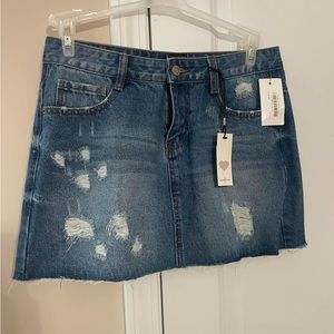 Distressed denim skirt
